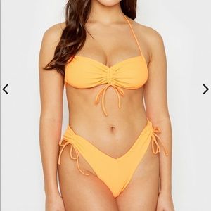 Frankie’s Bikinis orange bikini top + bottom